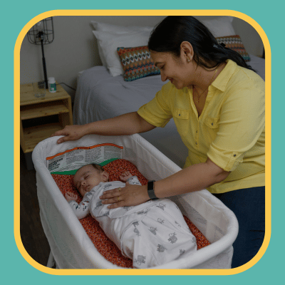 mom staying close to baby after putting them to bed